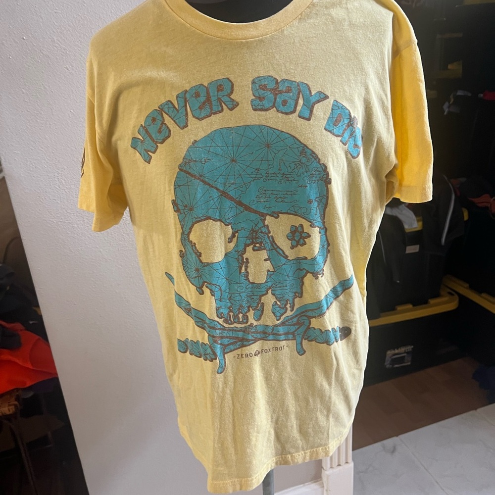 Yellow Graphic T-Shirt with Blue Skull Design by zero foxtrot size M